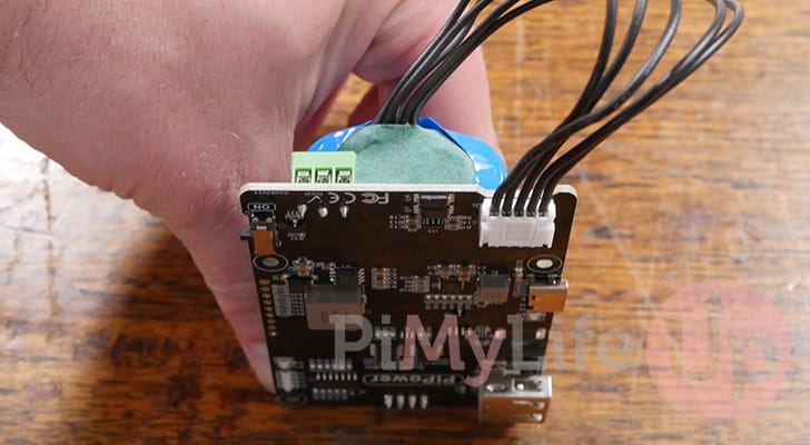 Plug battery into the Raspberry Pi PiPower UPS Main Board